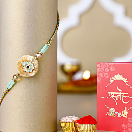 Delicious Honey Cake with Elegant Ethnic Rakhi Gift Set